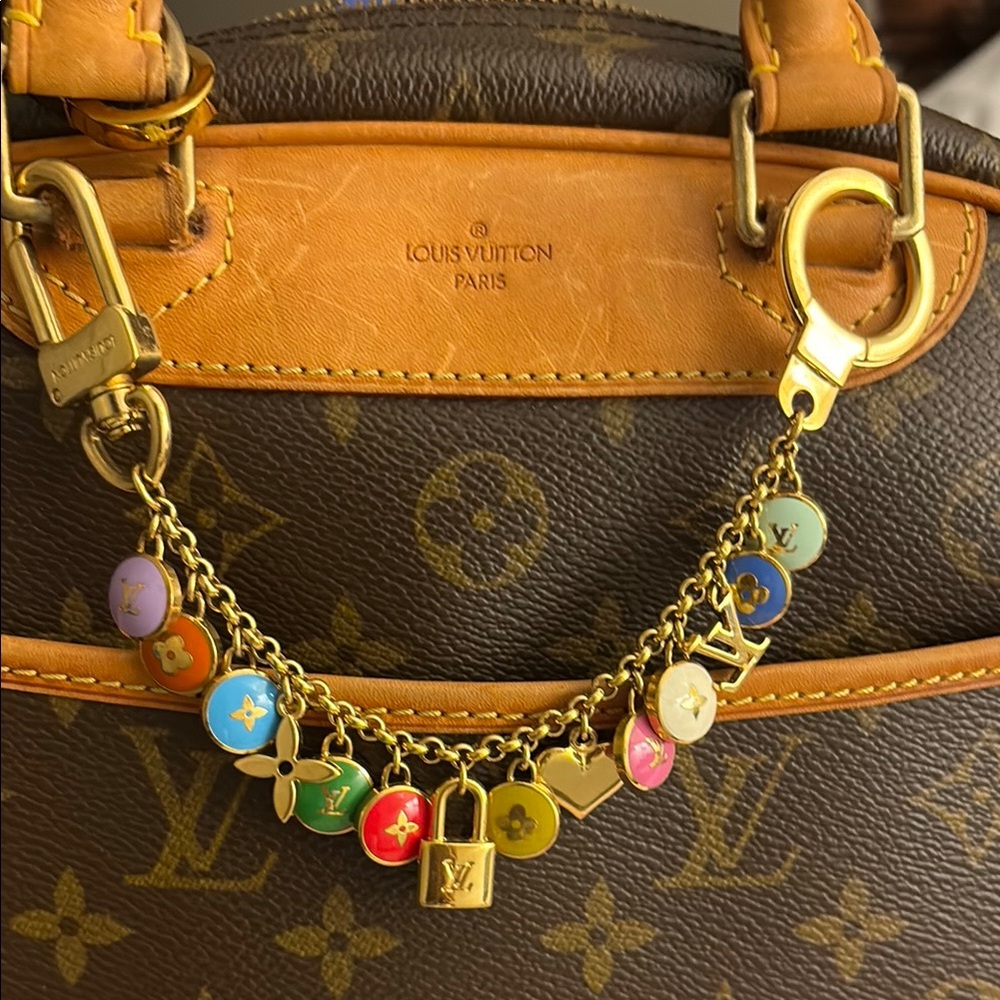 Louis Vuitton Gold toned Authentic pastille bag Charm *LV Bag not included